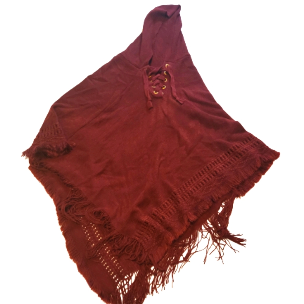 Minette hooded shawl with fat lace tie at neck and fringe hem.